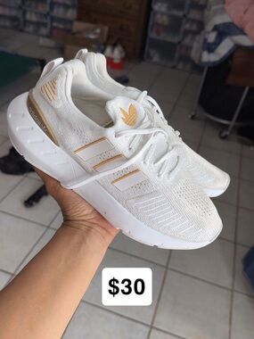 adidas Women’s White Sneakers with Gold Accents